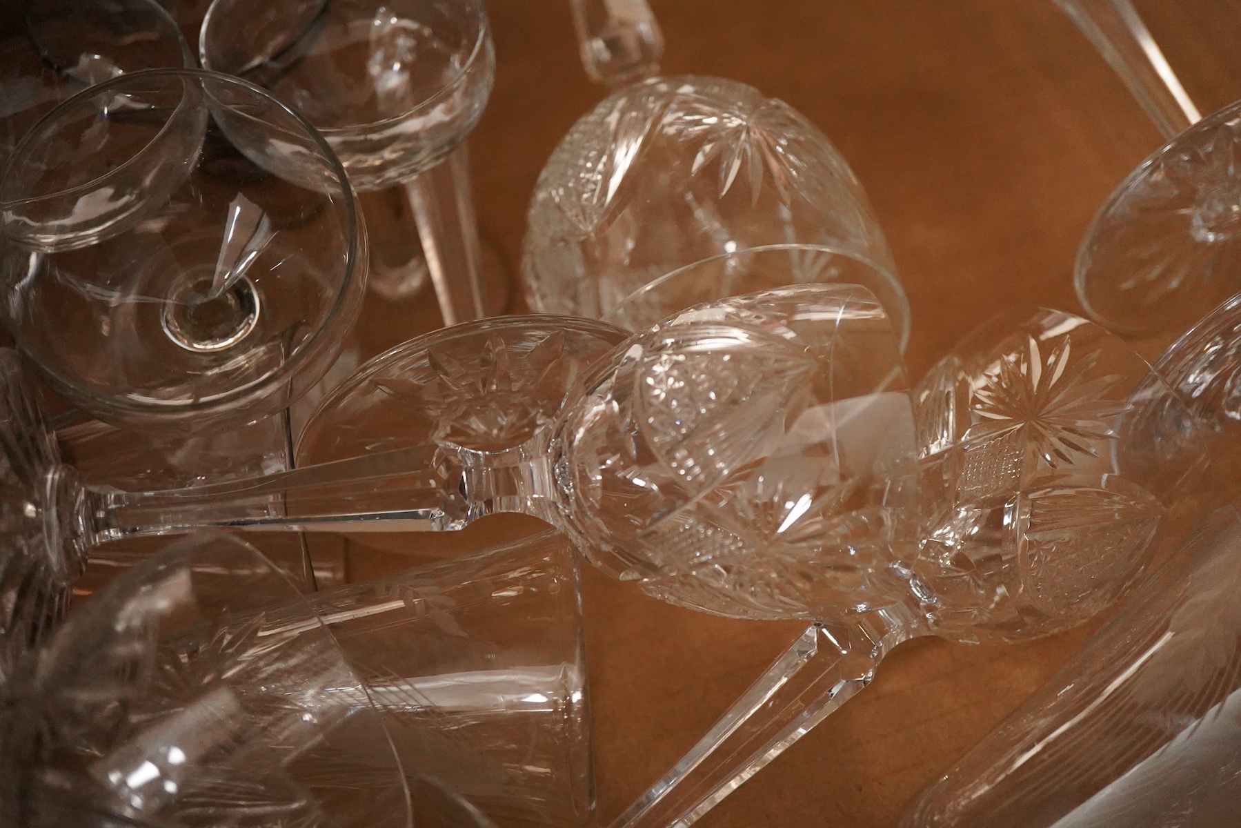 A mixed collection of cut glass wine glasses, spirit and other drinking glasses etc
